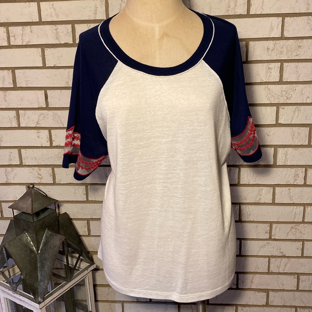 Torrid / Navy/Cream w/ red embroidered trim on sleeves. 
Size 1 = (1X or 14/16)